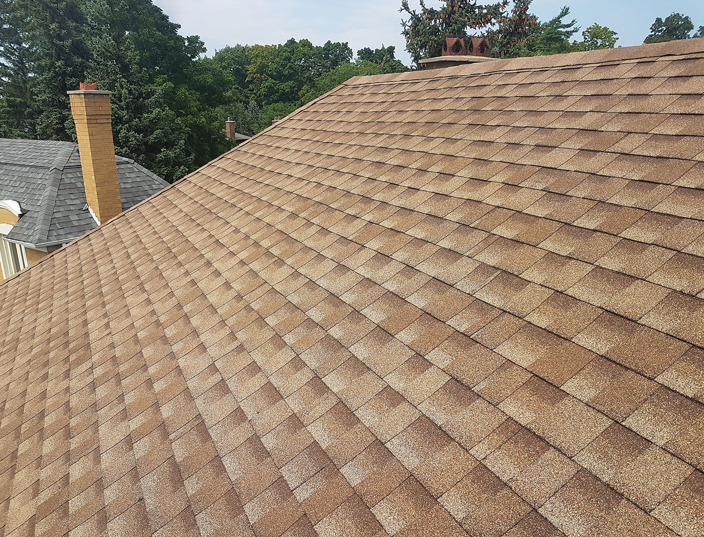 a newly installed tan roof in the GTA
